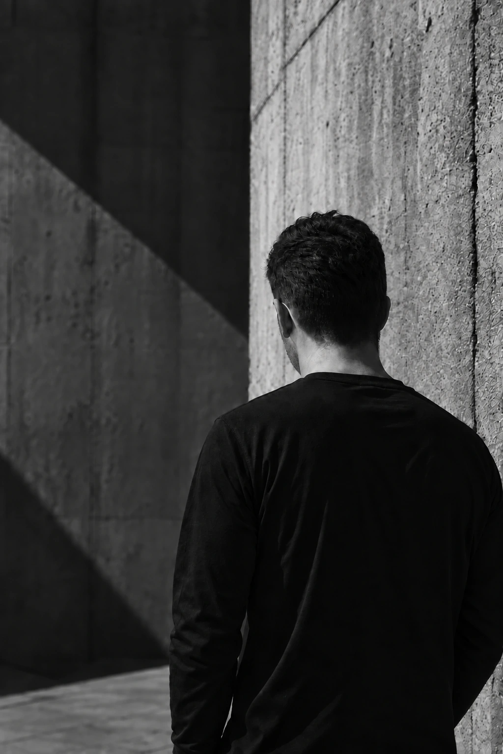 AI-generated rear-view portrait in a black long-sleeve shirt, with a hairstyle based on Omer Levi’s photograph.